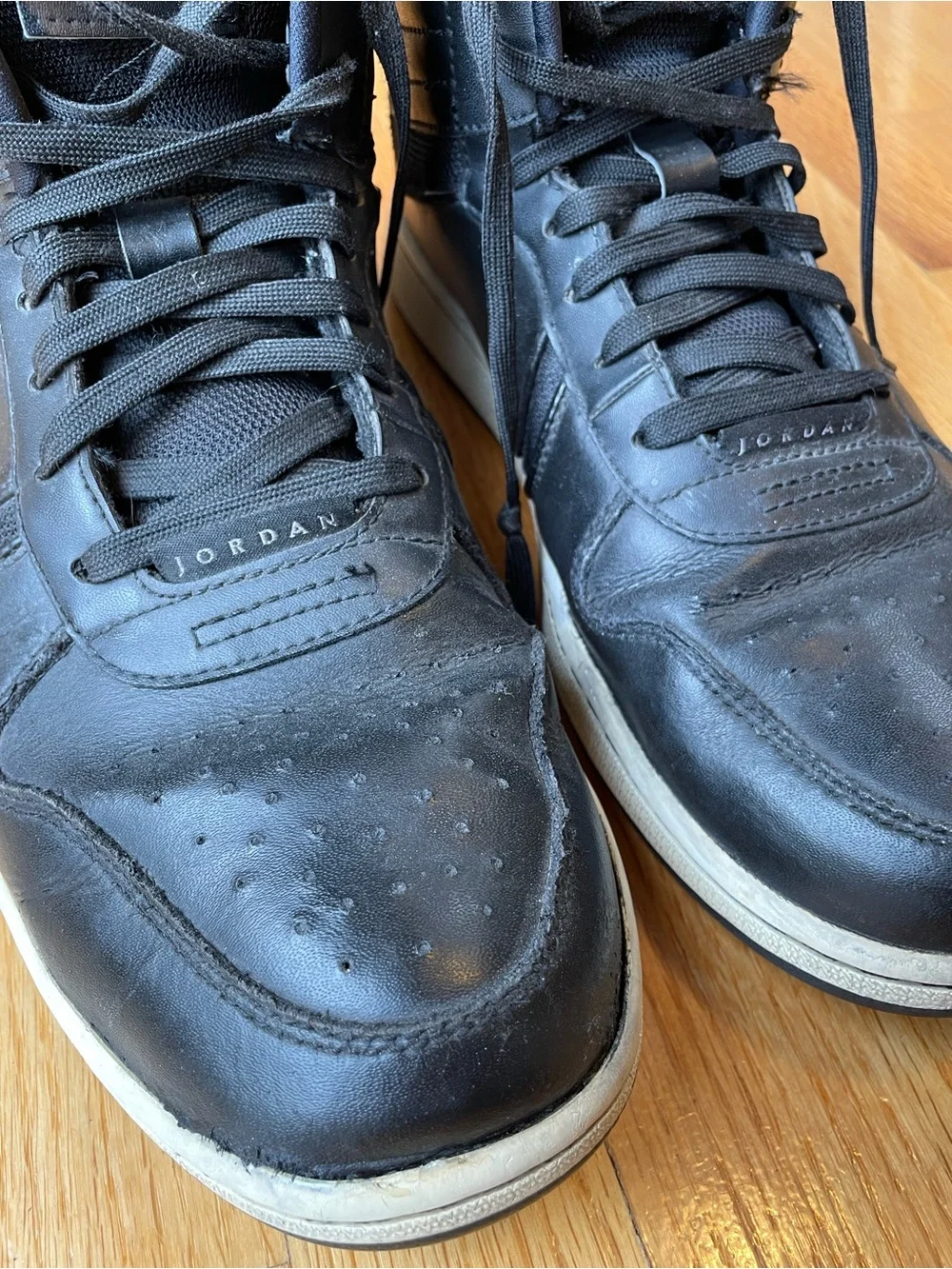 Men’s Size 12 Jordan Heritage Black and White High-Top Sneakers